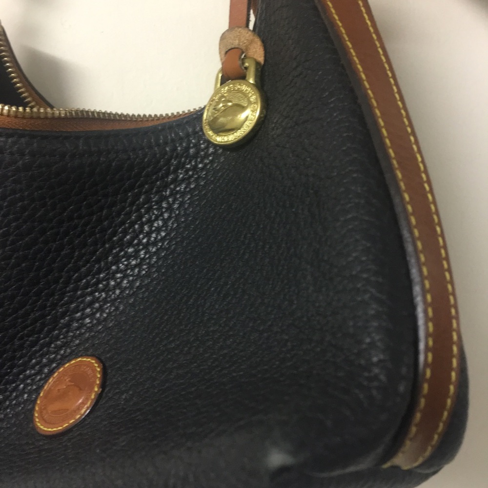 Black leather Dooney and Bourne bag